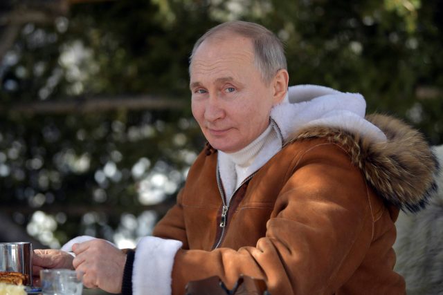 Vladimir Putin během dovolené,  na fotografii z roku 2021 | foto: Sputnik,  Reuters