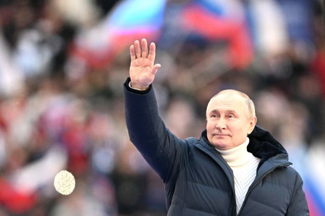 Ruský prezident Vladimir Putin při oslavách anexe Krymu v Moskvě | foto: ČTK