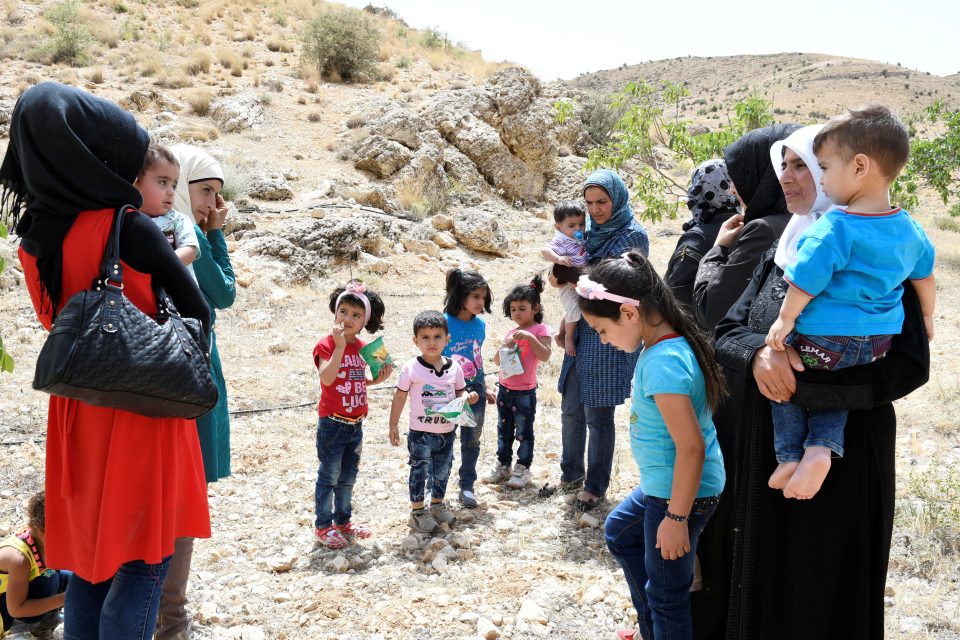 Syrští uprchlíci na hranicích Libanonu a Sýrie v regionu Arsal | foto: Reuters